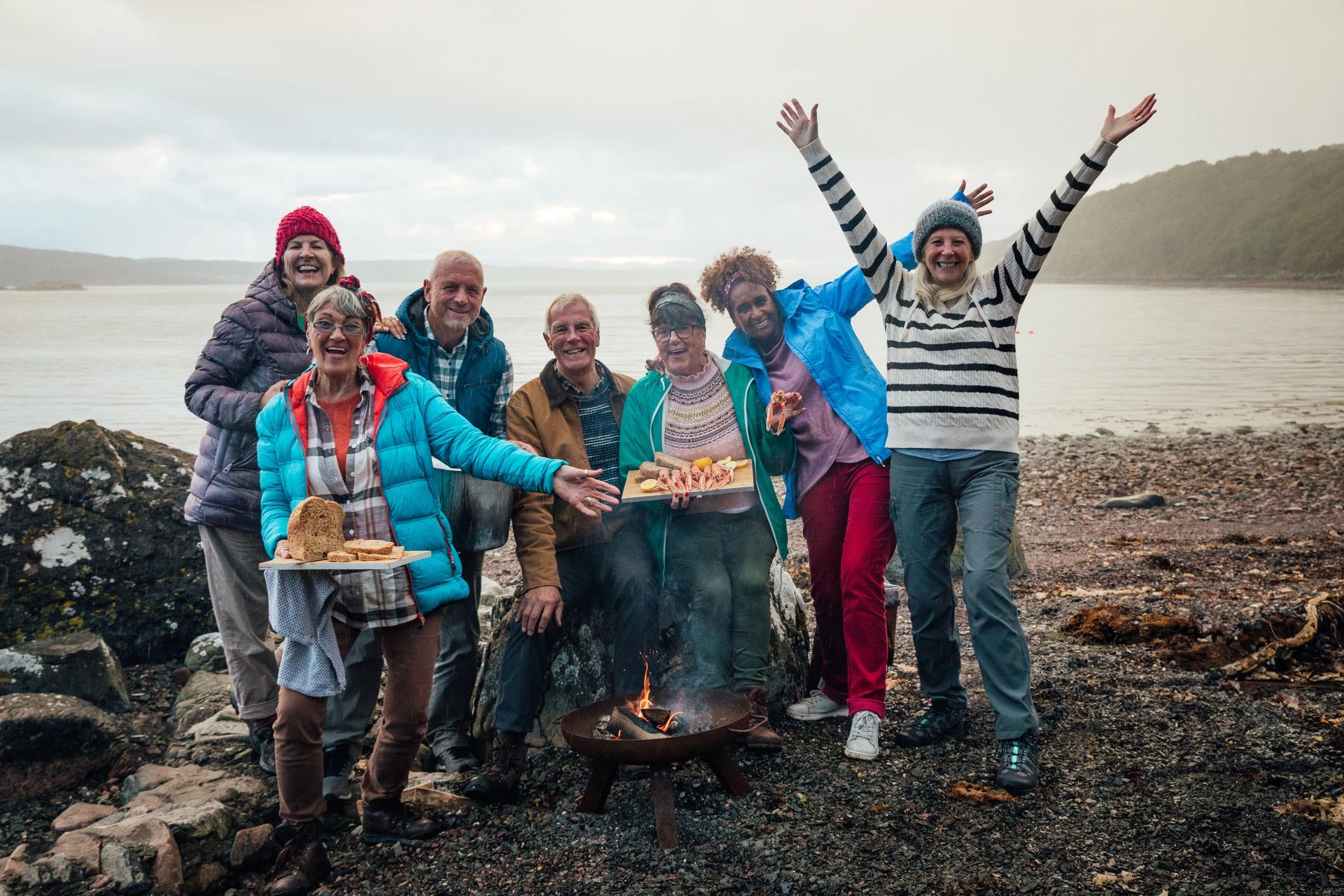 Roller Team Club style outdoor gathering around a fire pit