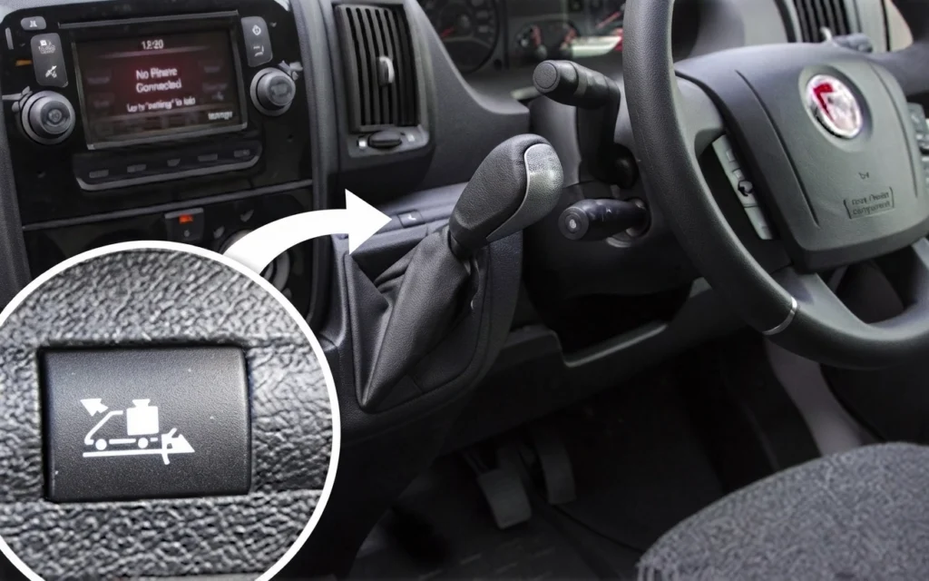 Fiat Ducato dashboard close-up showing the payload assist Up button